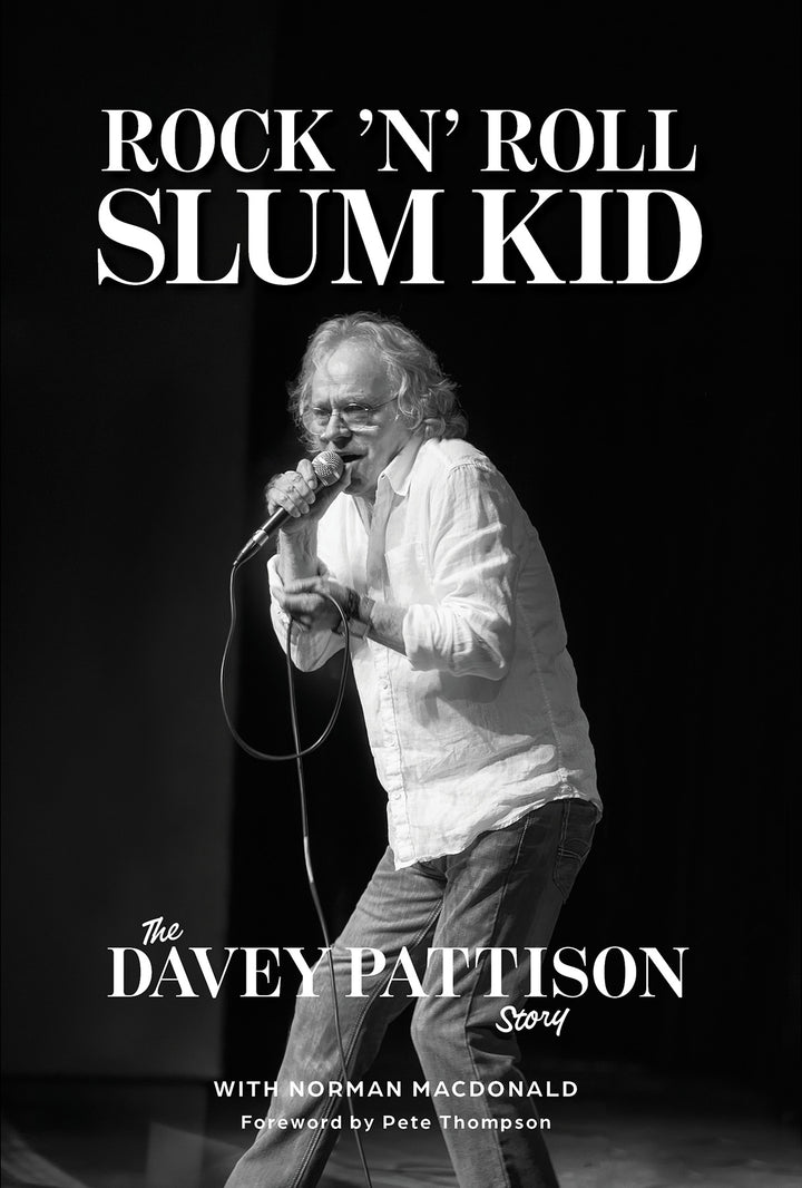 A man with white hair and glasses sings into a mic. Text: Rock ’n’ Roll Slum Kid—the Davey Pattison autobiography from Schiffer Publishing, Ltd.; Foreword by Pete Thompson, with Norman MacDonald.
