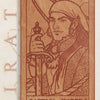The Pirate Tarot by Schiffer Publishing, Ltd. features a wooden card showing a pirate captain with sword, headscarf, and earring. The card reads "CAPTAIN - SWORDS" with “Willpower, Judgment, Authority”—ideal for any tarot or pirate game deck.