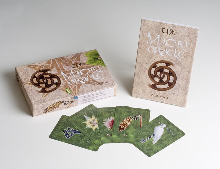 The Māori Oracle by Schiffer Publishing, Ltd. is shown with its box, guidebook, and five fanned-out cards, each displaying unique designs inspired by Māori culture and nature for spiritual guidance in New Zealand.