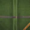 A green textured cover embossed with "The Chronicles of Destiny Fortune Cards" by Schiffer Publishing, Ltd., features two brown leather straps—one knotted at the bottom right—making it a must-have for fortune-telling card collectors.