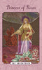 A medieval-style illustration of a crowned woman in a flowing gown with a rose, floral patterns, and "The Enchanted Love Tarot" by Schiffer Publishing, Ltd., inspired by Tarot art, on a pink background.