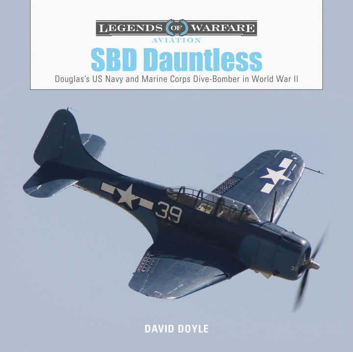 Book cover of 'SBD Dauntless' featuring a Douglas dive bomber against a clear sky.