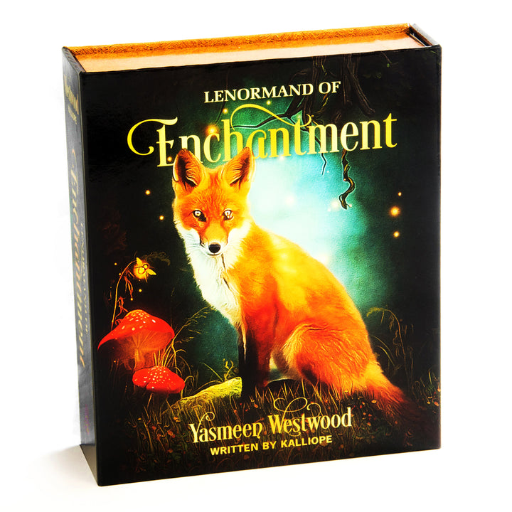 The Lenormand of Enchantment by Schiffer Publishing, Ltd. features an illustrated fox amidst glowing lights, mushrooms, and grass on the box, with enchanting cards designed by Yasmeen Westwood and Kalliope.