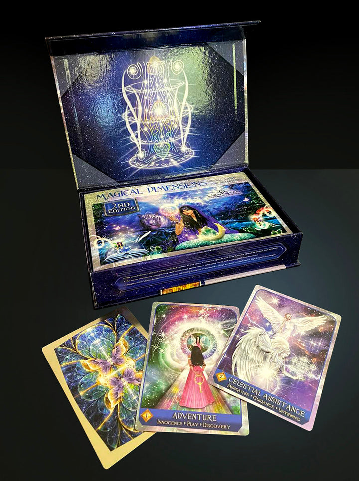 An open box of Magical Dimensions Oracle Cards and Activators by Schiffer Publishing, Ltd. reveals mystical, colorful cards: one with a butterfly, one titled ADVENTURE showing a woman in pink, and one titled CELESTIAL ASSISTANCE with an angel.