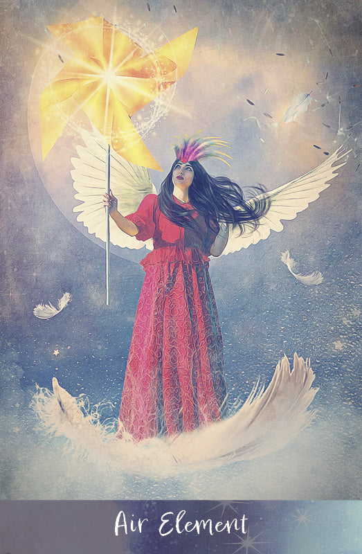 A woman in a red dress with white angel wings stands on clouds, holding a glowing yellow pinwheel. She wears a colorful mask as feathers float nearby. "Air Element" appears at the bottom of the Angels of Healing and Hope Oracle by Schiffer Publishing, Ltd.