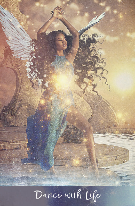 A graceful woman with angel wings and flowing hair dances by water under a golden, starry sky on the Angels of Healing and Hope Oracle by Schiffer Publishing, Ltd. She wears a blue dress, sparkling with light, and "Dance with Life" is written at the bottom.