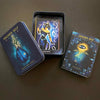 The Higher Self Oracle by Schiffer Publishing, Ltd. is shown with its tin box, a card featuring a mystical cat, and a guidebook with an abstract face—ideal spiritual guidance cards for seekers.
