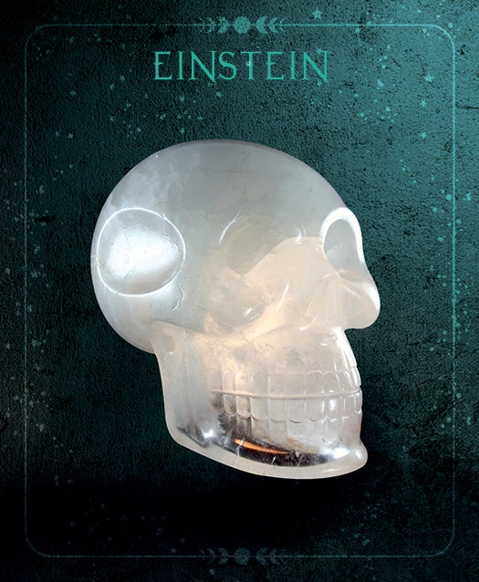 The "Oracle of the Crystal Skulls" by Schiffer Publishing, Ltd. features a striking crystal skull sculpture set against a dark textured background with EINSTEIN above, capturing the mystical allure and spiritual intrigue of crystal skulls.