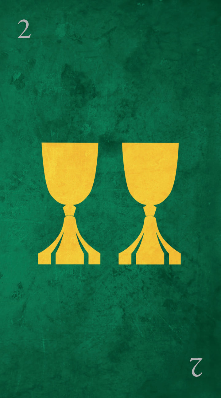 A green Tarot Médiéval card by Schiffer Publishing, Ltd. displays two yellow cups side by side, with the number 2 in white at the top left and bottom right corners, designed in a medieval style.