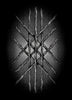 Ten textured wooden sticks are arranged symmetrically in crisscrossed layers against a dark gradient, evoking woven geometry reminiscent of the Nightfall Tarot by Schiffer Publishing, Ltd.