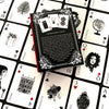 The Inner Eye Oracle by Schiffer Publishing, Ltd. features a decorative book with playing card artwork on the cover, displayed on illustrated playing cards and oracle cards labeled “Romance,” “Strength,” and “Compliment.”.