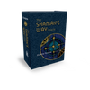 The Shaman’s Way Oracle by Schiffer Publishing, Ltd. is a blue box set featuring Michelle Motuzas’ circular tribal design in gold, blue, and green—an inspiring oracle deck for spiritual healing card seekers.