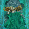 A regal woman with long hair and a golden crown sits on a throne in an elegant teal gown, embodying Celtic goddesses. Intricate teal patterns frame her—Domnu appears below. From Celtic Goddesses, Witches, and Queens Oracle by Schiffer Publishing, Ltd.