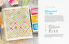 The "Modern Watercolor Workshop" by Schiffer Publishing, Ltd. features a vibrant diamond trellis watercolor painting alongside a spiral sketchbook, paintbrush, and four bright paints—pink, yellow, blue, and orange—ideal for beginner projects.