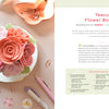 A pastel pink teacup with lifelike felt flowers sits on a saucer by scattered stationery—perfect inspiration from "HeartFELT Crafts to Make and Give" by Schiffer Publishing, Ltd. for beginner crafters or handmade home decor.