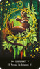 A relaxed brown cat lounges on its back among green leaves and golden shapes. Card 38 – Luxury from The MicroCosmic Oracle by Schiffer Publishing, Ltd. features Venus in Taurus symbols at the bottom.