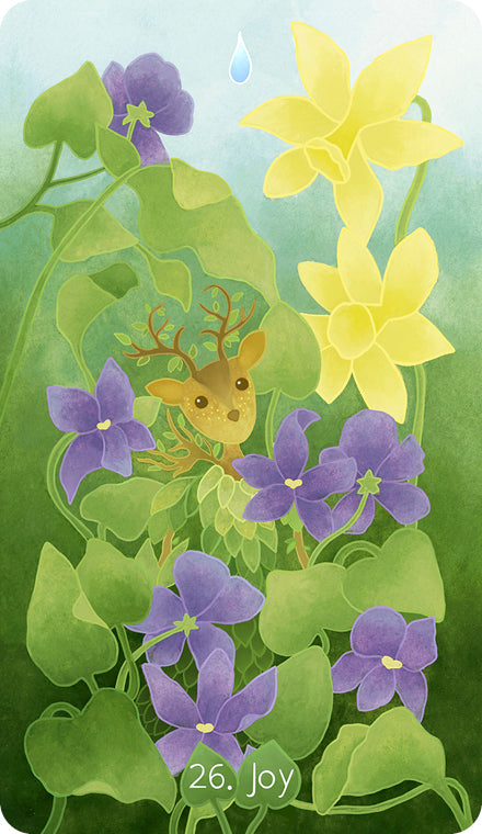 A whimsical creature with antlers peeks from lush vines among yellow and purple flowers in a vibrant forest. From "The Liminal Woods Oracle" by Schiffer Publishing, Ltd, a single water droplet glows above the joyful scene.