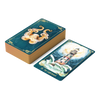 A deck of teal Oracle of the Mythical Ocean cards featuring an octopus, with one card placed face-up showing a lighthouse amidst crashing waves and the text 30. The Lighthouse.