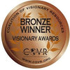 A round bronze medal reads "Bronze Winner Visionary Awards" with "Coalition of Visionary Resources" and "www.covr.org" around the edge, with leaf motifs, awarded for The Art of Flower Therapy by Schiffer Publishing, Ltd.