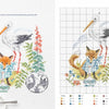 Fables & Fairy Tales to Cross Stitch by Schiffer Publishing, Ltd. offers a fairy tale pattern inspired by Véronique Enginger, with a fox in blue clothes, a stork, and a sleeping gray cat amidst flowers, greenery, and whimsical details.