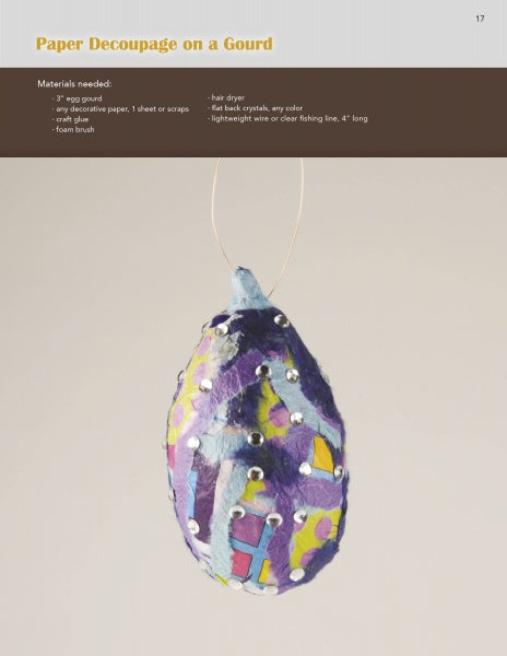 One Gourd at a Time" by Schiffer Publishing, Ltd. shows how to craft a painted gourd ornament decorated with colorful paper, blue paint, and flat-back crystals. Step-by-step instructions and materials are provided above the image.
