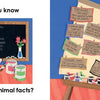 A colorful chalkboard from Guess Who Is behind the Door by Schiffer Publishing, Ltd. lists animal names with art supplies, while an easel displays fun fact cards—sparking kids’ curiosity about animals, colors, and numbers in a playful way.