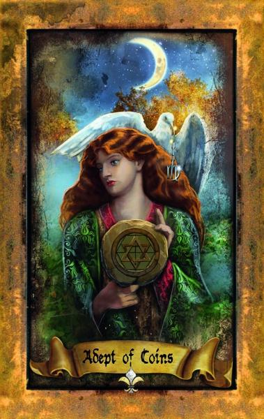 A woman with long red hair in a green robe holds a pentacle coin. A white dove perches on her shoulder beneath a crescent moon, trees behind her. The card, "Adept of Coins," is from The Illuminati Tarot by Schiffer Publishing, Ltd.
