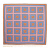 Quiltings, Frolicks, & Bees by Schiffer Publishing, Ltd. showcases a c.1930 cotton square quilt of 25 blue and pink X-pattern blocks with an orange border on pink, reflecting the artistry of quilting communities.