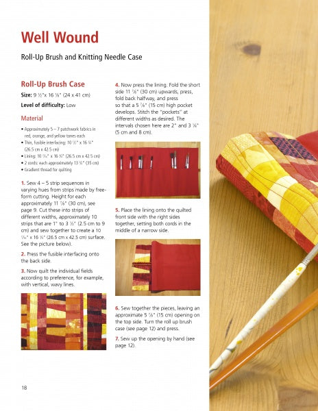 A vibrant quilted roll-up case, shown with knitting needles and scissors on a wooden table, is featured alongside printed instructions from "Free-Form Patchwork Techniques" by Schiffer Publishing, Ltd.