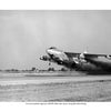 A Boeing B-47 Stratojet, featured in Schiffer Publishing, Ltd.'s history, takes off with water injection trails and extended gear, dark smoke behind and trees in the background—a striking SAC jet scene.