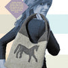 A woman with long hair carries a handmade bag over her shoulder from Fun Felt Crafts (Schiffer Publishing, Ltd.), featuring recycled wool, earthy tones, and a bold horse silhouette. Pastel stripes and a text box highlight the horse-themed design.