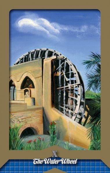 A large wooden water wheel is fixed to an old stone building with arches in a lush landscape under a blue sky—an image reminiscent of the mystical designs in Schiffer Publishing, Ltd.'s Tarot of the Moors deck. The text below says The Water Wheel.