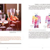 In "Master Your Craft" by Schiffer Publishing, Ltd., a book spread features a photo of elegant gold-accented wine glasses on the left and a vibrant jacket sketch labeled “Front” and “Back” on the right, showcasing artisanal expertise.