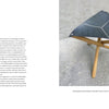 A magazine spread showcases "On the Edge of Your Seat" by Schiffer Publishing, Ltd.: text about designer Bob Brox's influence on American furniture on the left, and a photo of a black triangular stool with wooden legs on a gray stone floor on the right.