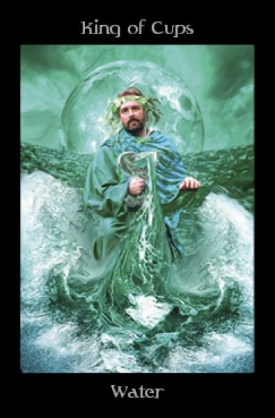 The Pagan Ways Tarot by Schiffer Publishing, Ltd. features a “King of Cups” card depicting a regal, bearded figure in green-blue robes among waves, holding a staff with a glass orb behind him.