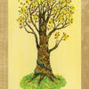 Illustration of a budding tree with flowers on green grass against a yellow backdrop. The label SPRING at the bottom reflects self-awareness, inspired by Schiffer Publishing, Ltd.’s Tree of Life Oracle deck.