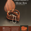 The book "Home Woodworker Series: 14 Wooden Boxes You Can Make" by Schiffer Publishing, Ltd. offers step-by-step instructions and creative gift ideas for making beautiful wooden jewelry boxes, such as the heart-shaped music box shown open with jewelry inside.