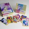 The Dream Raven Tarot by Schiffer Publishing, Ltd. is shown spread out with its vibrant box and guidebook, featuring illustrated ravens in bold, symbolic scenes.