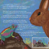 On the cover of "Rupert's Tales: A Book of Bedtime Stories" by Schiffer Publishing, Ltd., a colorful frog and a large brown rabbit face each other by blue water, with story text about bedtime and dreams overlaid on the image.