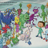 A smiling boy in pajamas stands on ice, surrounded by colorful, friendly robots and aliens. The text reads: I want to meet aliens of all different shapes and sizes and colors… from "I'm Going to Outer Space!" by Schiffer Publishing, Ltd.