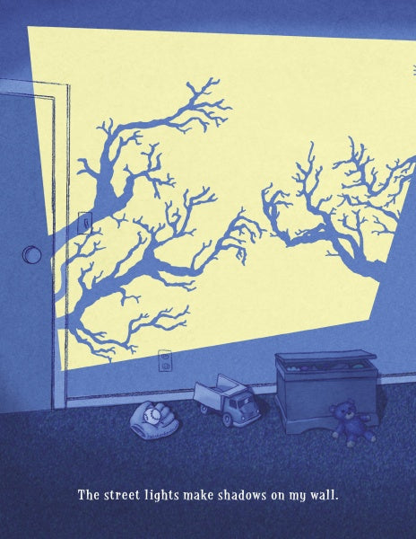 A nighttime room with toys and a toy box; window light casts tree branch shadows on the wall. Text: "The street lights make shadows on my wall—a children's book about fears." Shadows on My Wall by Schiffer Publishing, Ltd.