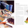 A vibrant array of crafting materials from Macramé Couture by Schiffer Publishing, Ltd.—including ribbons, fabric, thread spools, and metal clips—arranged beside an open instruction book for creating unique accessories.