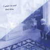 A lonely child with glasses sits on a windowsill in a blue-tinted room, sunlight shining in. Inspired by the autism book *I Am Odd, I Am New* from Schiffer Publishing, Ltd., text reads: "I want to not feel blue.