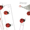 An illustration from "1, 2, 3, Lili's Counting" by Schiffer Publishing, Ltd. shows a gray mouse with a pencil and seven red ladybugs on a ruler and the mouse’s nose—perfect for introducing numbers in this delightful board book.