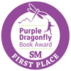 A circular purple badge with a dragonfly and a person holding a string. Text: "Purple Dragonfly Book Award SM First Place," honoring Schiffer Publishing, Ltd.'s graphic novel "Marvin.